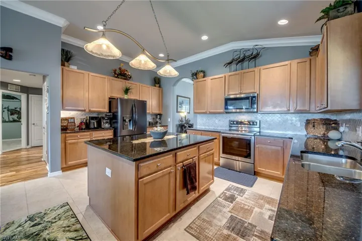 The chef's kitchen is the center of the home