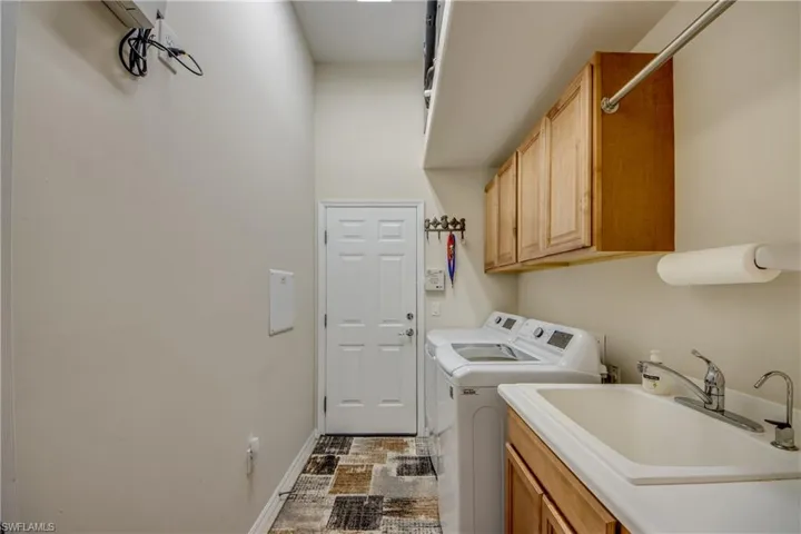 Laundry Room inside with cabinets, built in Laundry sink with cabinet
