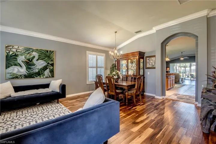 View from front door, Crown Molding and Acacia Wood Floors, large baseboards