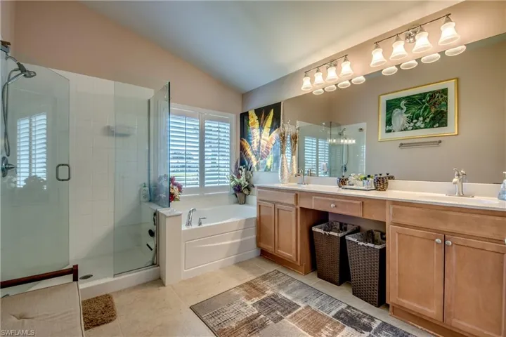 Glass Shower, Garden Tub, Double sinks, and seperate toilet closet