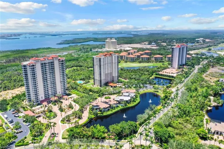 Bird's eye view of a large body of water and apartment complex