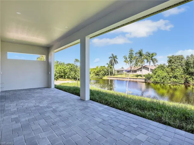 View of patio / terrace with a water view