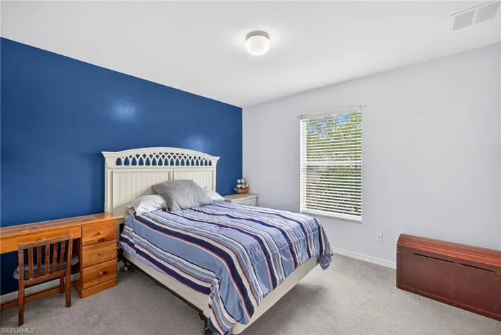 Third bedroom offers a comfortable space.