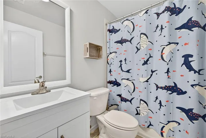 Upstairs bathroom is complete with a full-shower/tub combo.