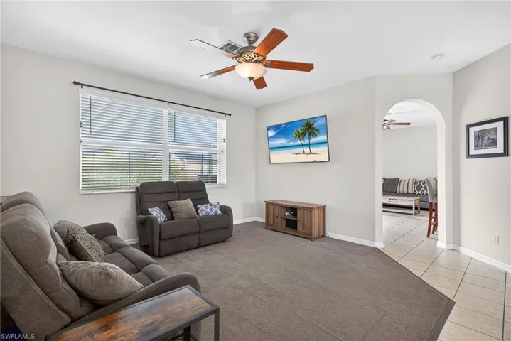 Expansive sitting area and living room are perfect for friends and family to gather together.