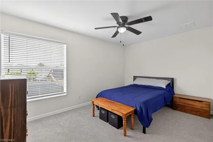 Southwest-facing second bedroom is filled with beautiful natural light.