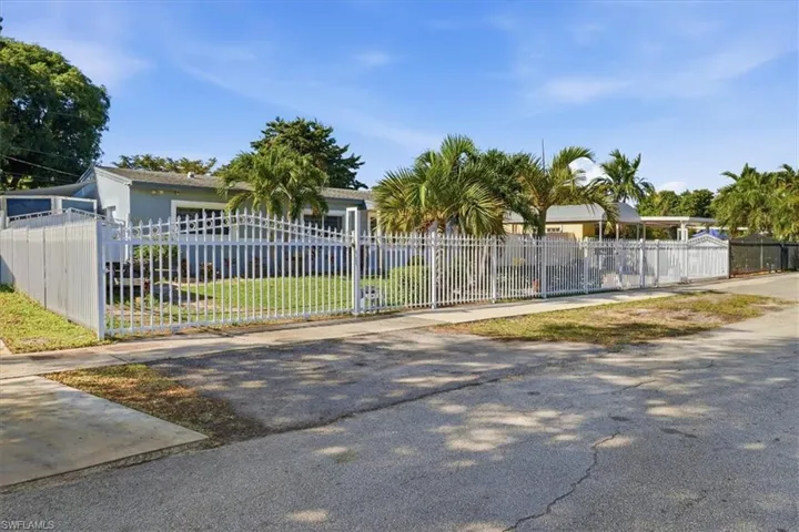 Gate with a fenced front yard