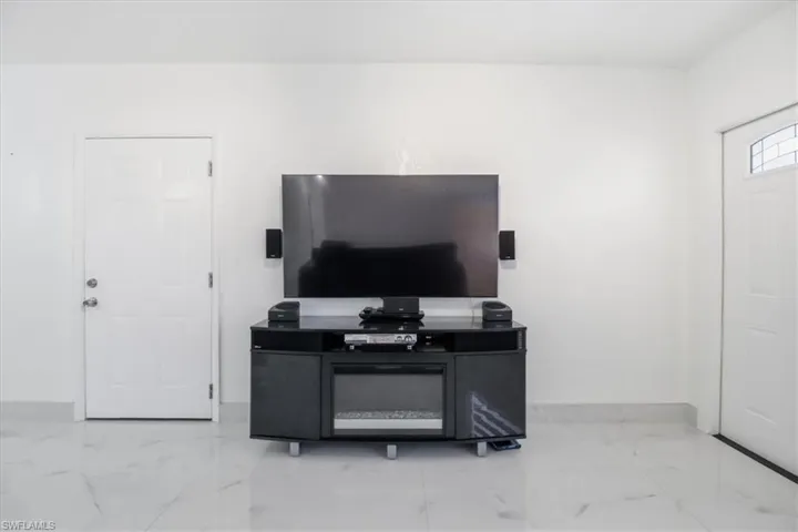 Living room with light marble finish floors