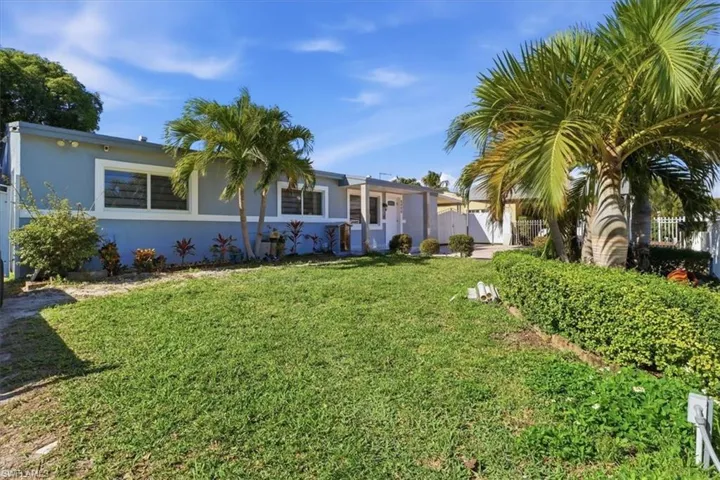 View of front of home with stucco siding