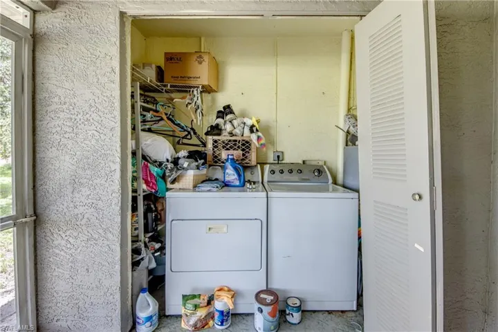 Clothes washing area with washing machine and dryer