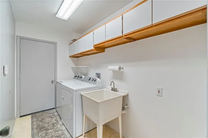Spacious laundry room in residence.