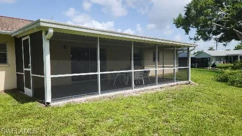View of home's exterior featuring a lanai
