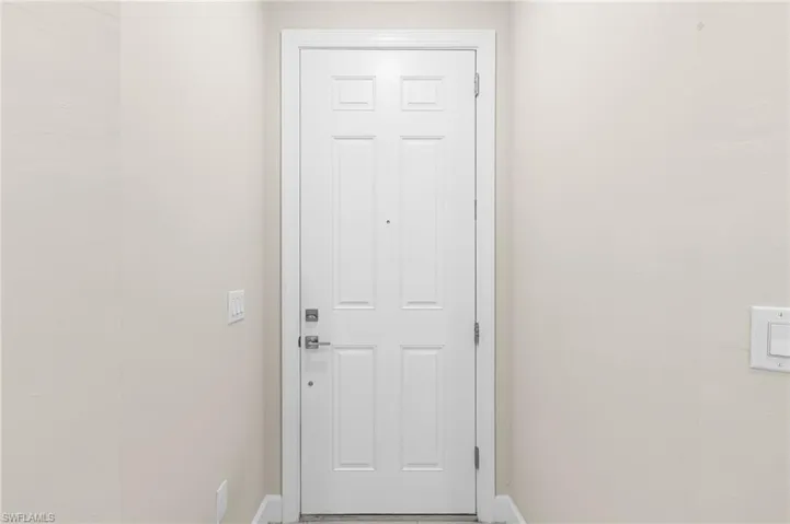 Entryway featuring baseboards