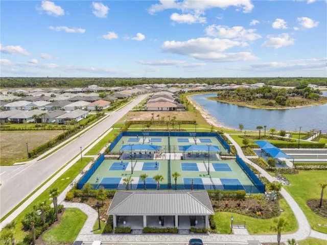 Aerial view of residential area with a large body of water