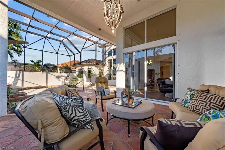 View of patio / terrace with glass enclosure and an outdoor hangout area
