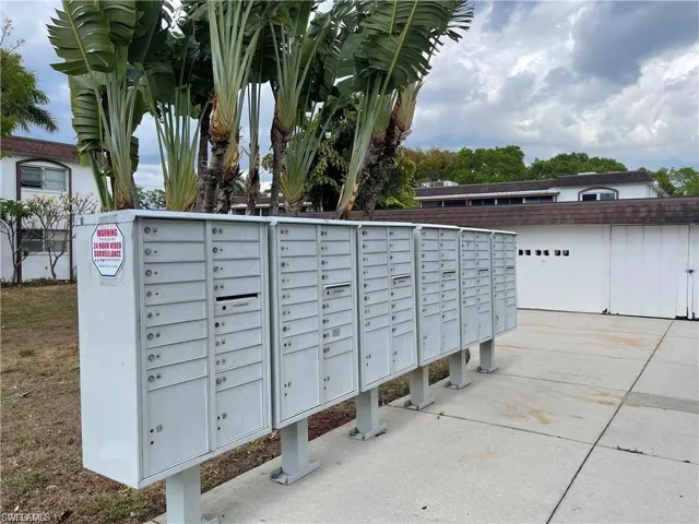 View of home's community featuring mail area