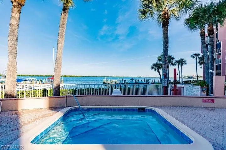 View of pool featuring a water view