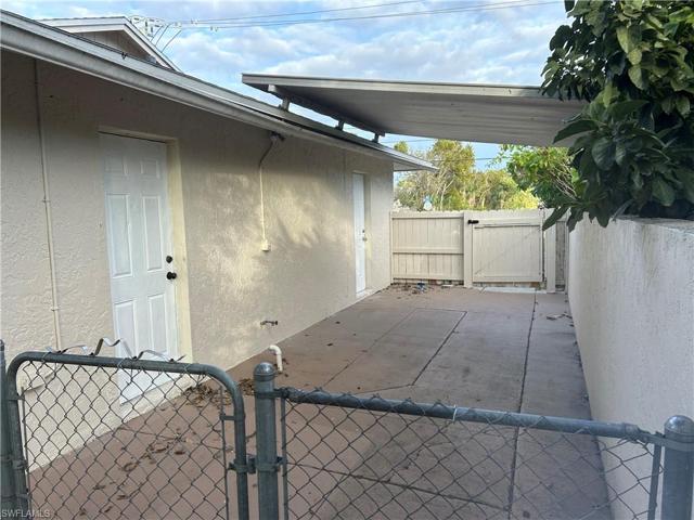 Private side yard with entry doors to bedroom 2 & 3