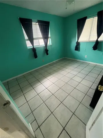 View of tiled spare room