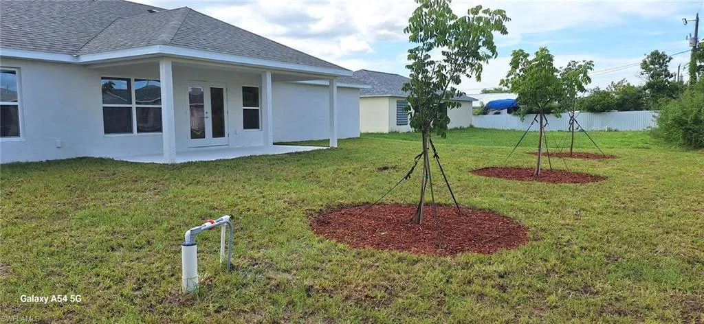 View of yard with a patio