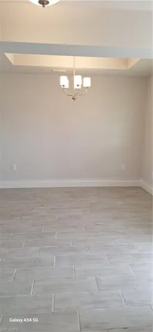 Unfurnished room featuring wood finished floors