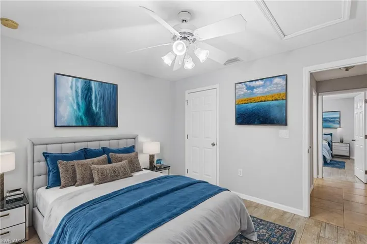 Bedroom featuring light hardwood / wood-style flooring and ceiling fan