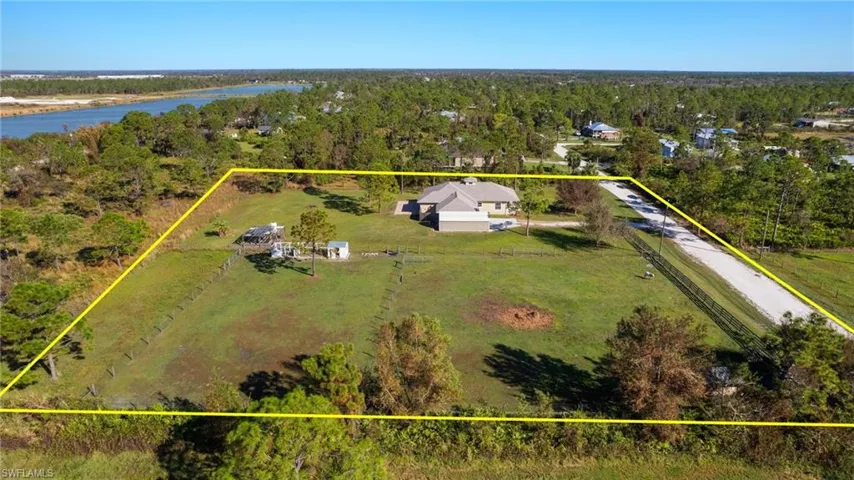 Drone / aerial view featuring a rural view and a water view