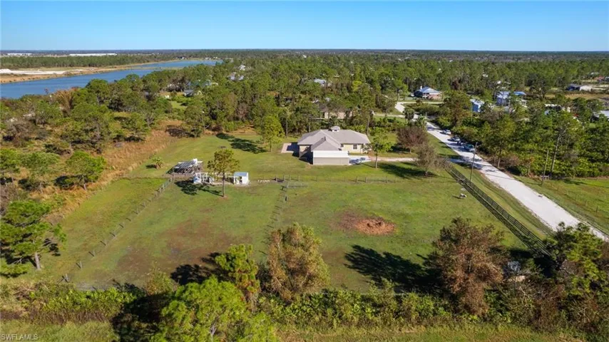 Drone / aerial view featuring a rural view and a water view
