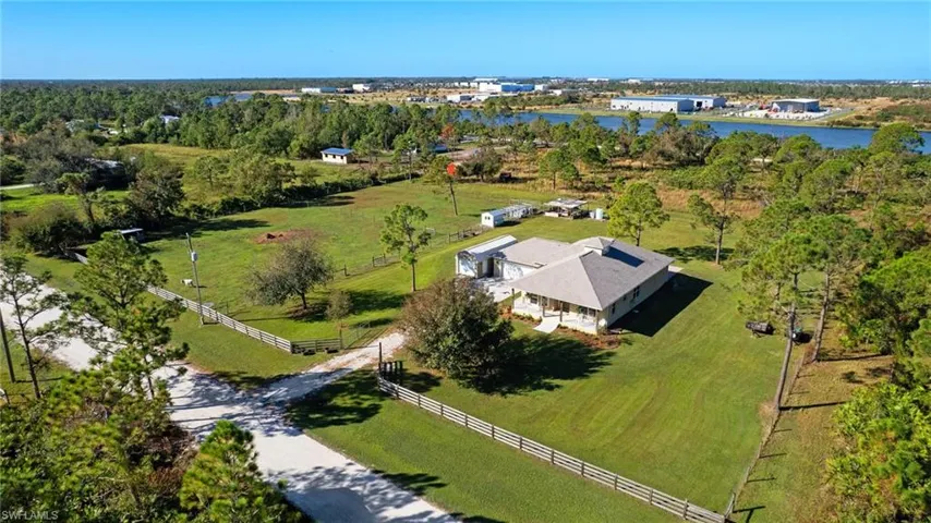 Drone / aerial view with a rural view and a water view