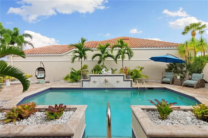Outdoor pool with a patio area