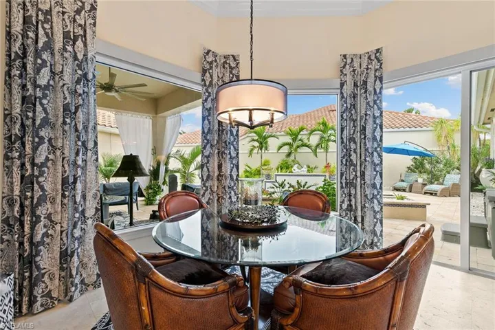 Dining space with crown molding