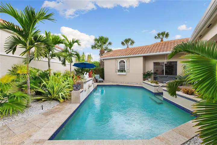Outdoor pool with a patio area