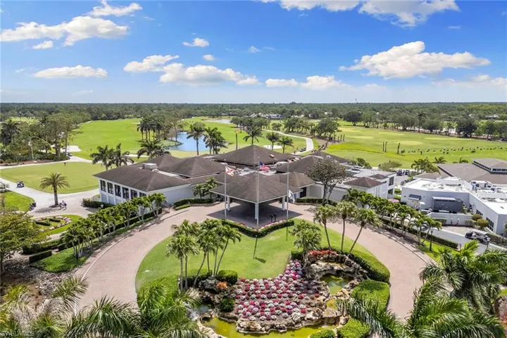Drone / aerial view of a local golf course and a large body of water