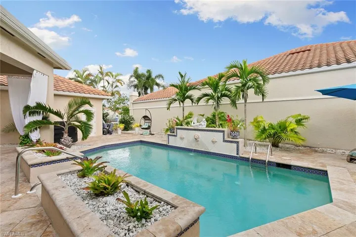 Outdoor pool with a patio