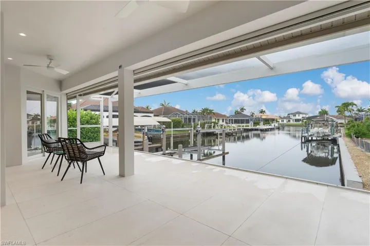 Open air lanai with electric screen to have best of both worlds.