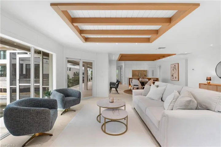 Open great room with impact rated sliders for peace of mind, efficiency, and security.