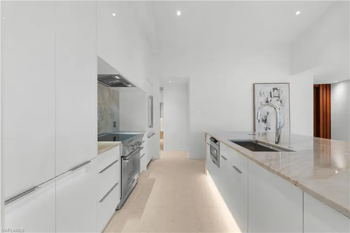 Sleek modern kitchen with high-end appliances.