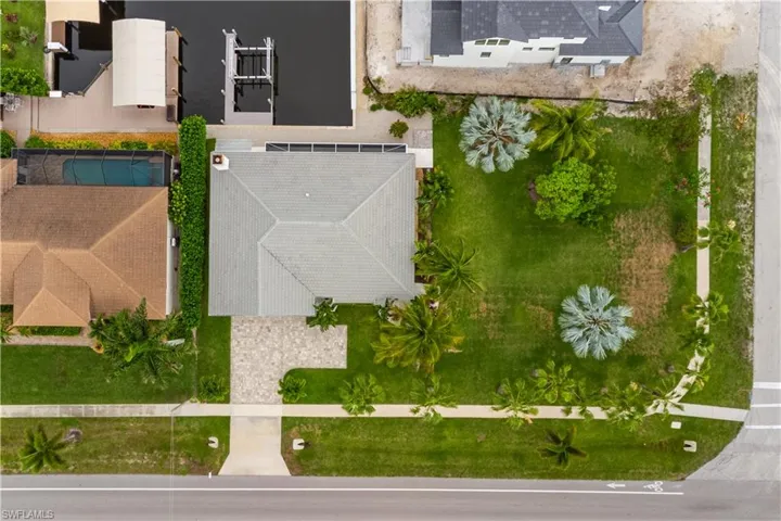 Large corner lot to add your custom pool, tiki, or whatever you desire.