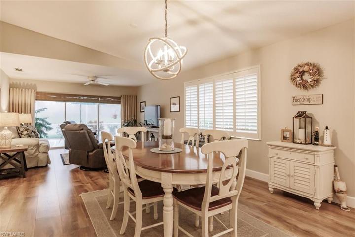 Kitchen flows into dining area.