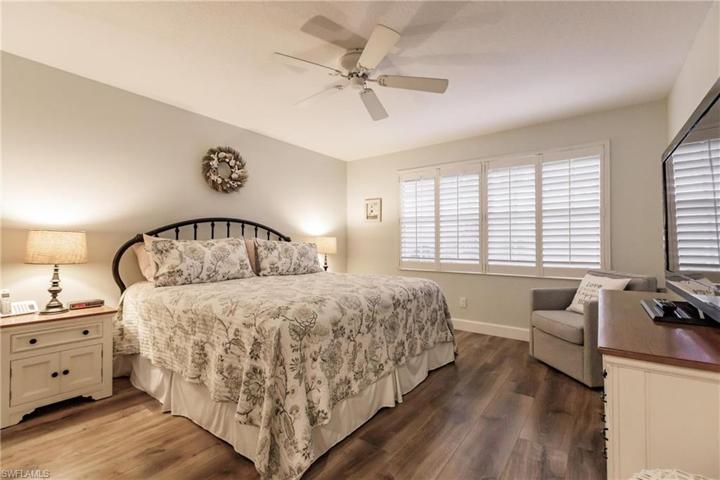 Master bedroom has views of lake.