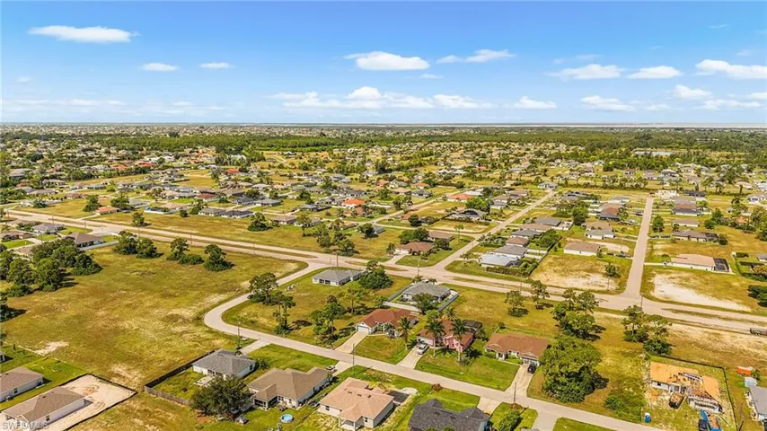 Expansive residential area featuring numerous single-story homes, established street grid, and scattered mature trees
