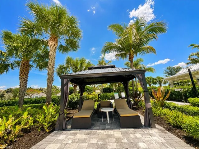 Relax under a cabana at poolside