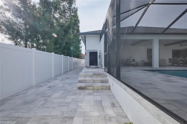 Paver walkway from driveway to rear screen