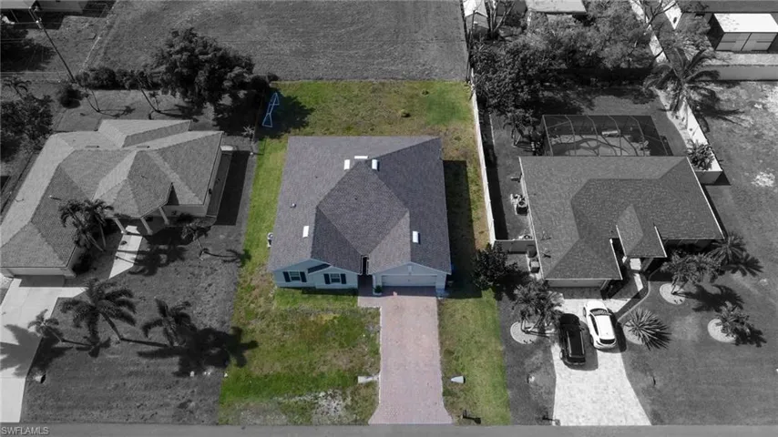 Birds eye view of property with a residential view