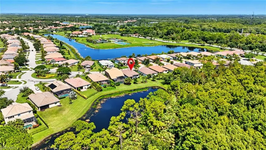 Aerial view of residential area with a large body of water