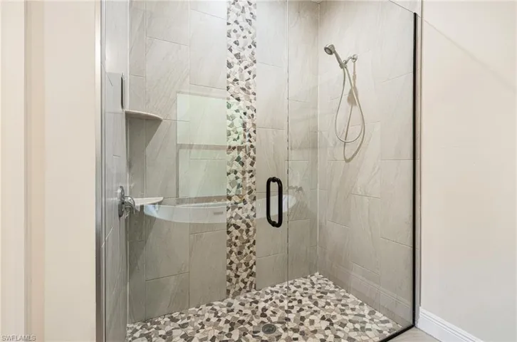 Bathroom with an enclosed shower