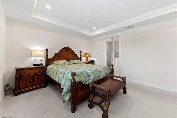 Master bedroom, doorway leads to ensuite bath and large walk-in closet