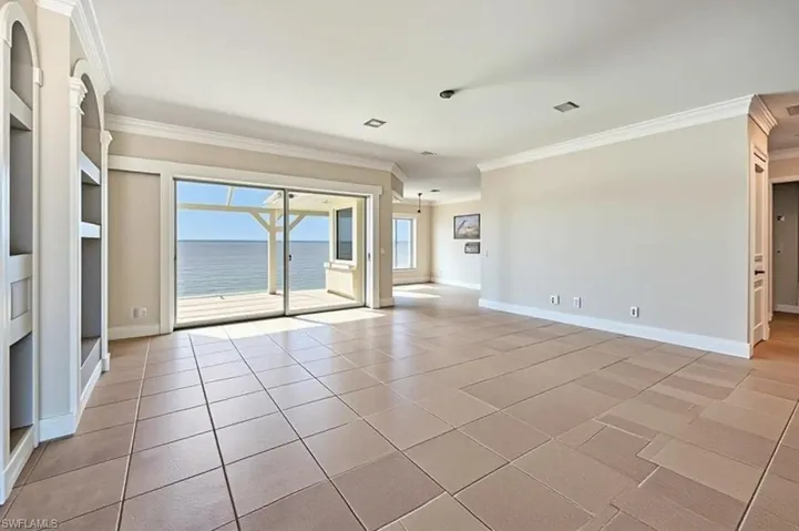 Virtually modified photo-GREAT ROOM FACING LANAI & RIVER