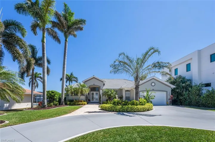 FRONT OF HOME W/CIRCULAR DRIVEWAY
