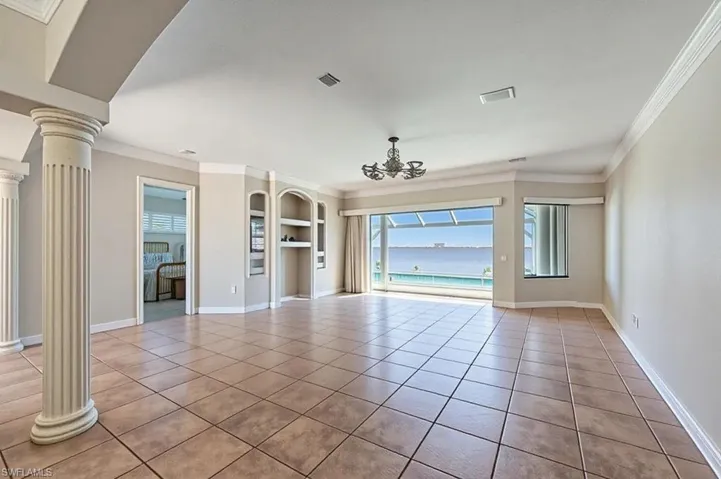 Virtually modified photo-GREAT ROOM FACING LANAI & RIVER